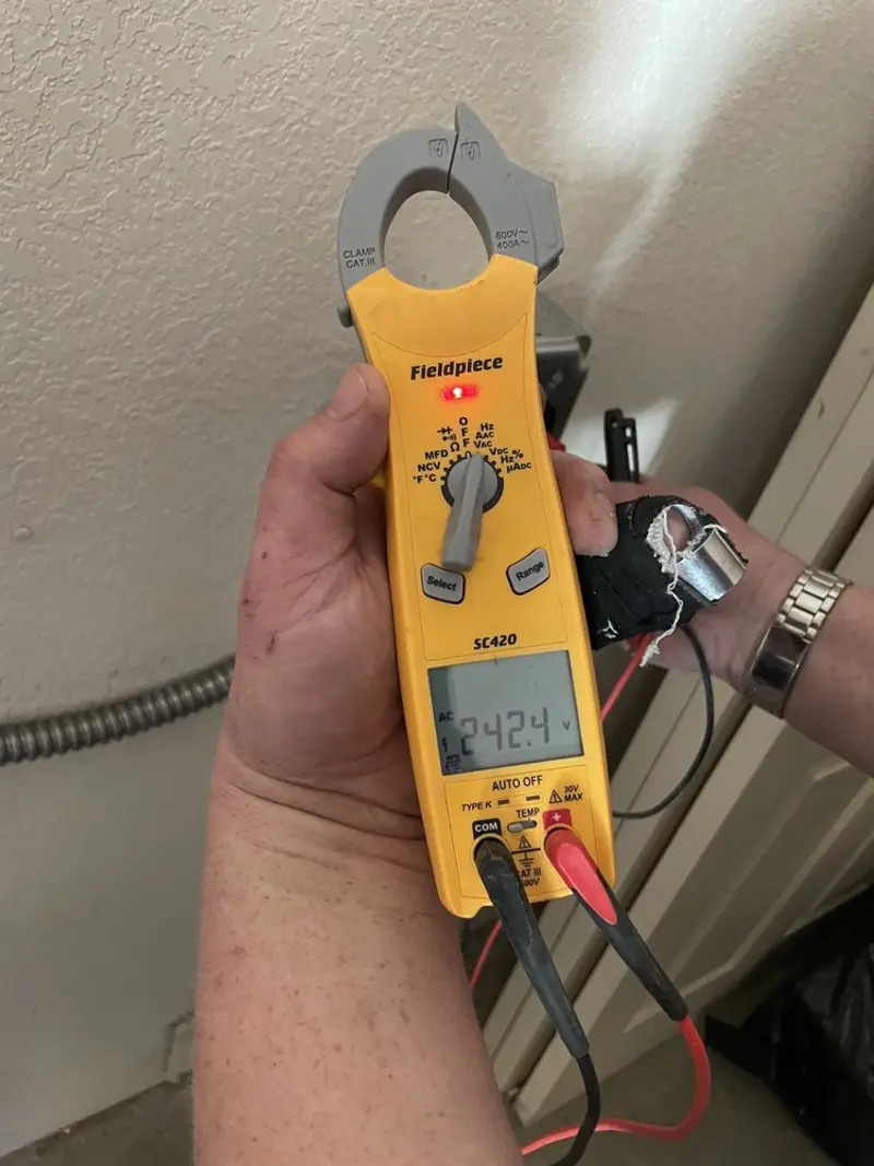 Voltage testing with clamp meter during Hot Tub / Pool Electrical Wiring in Joliet